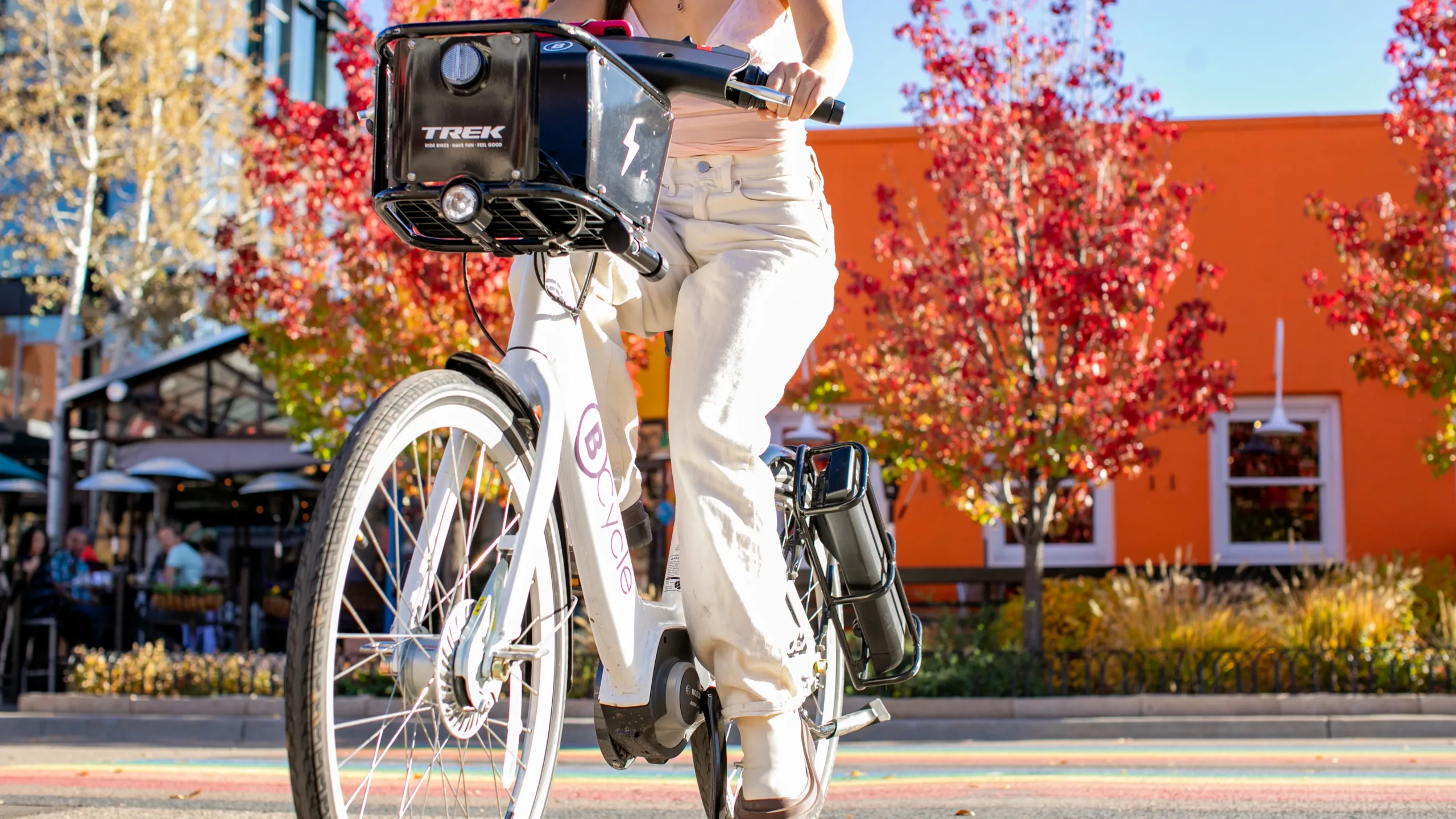 woman riding a bike share bicycle